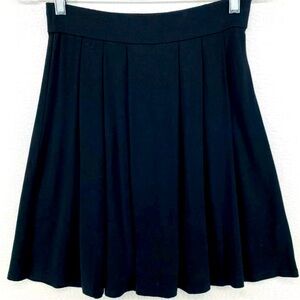 Eileen Fisher short pleated black jersey stretch skirt‎ with pockets, size L
